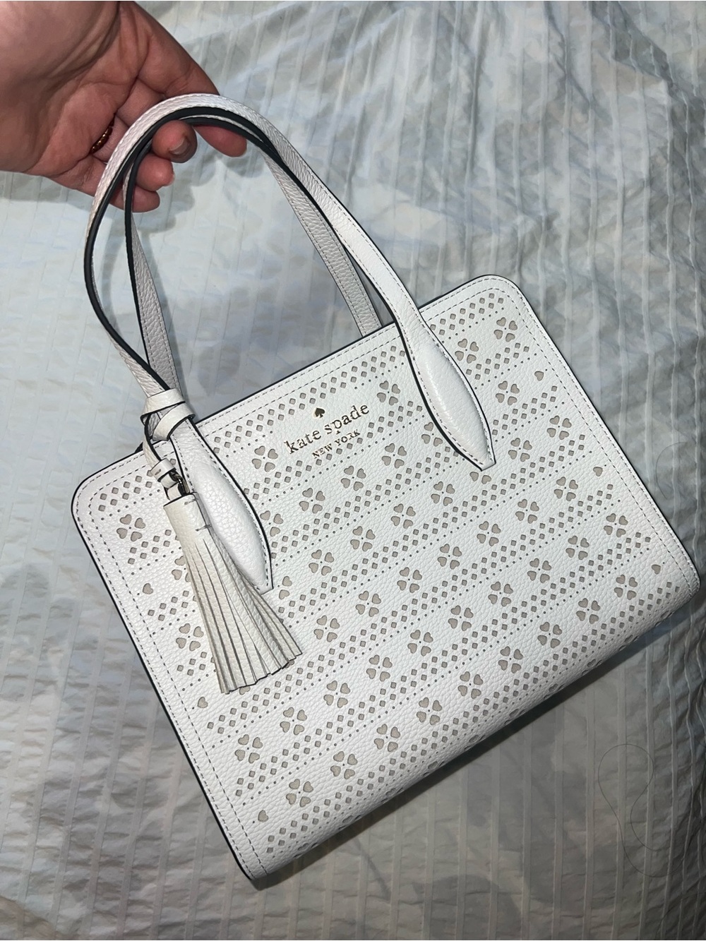 kate spade White Perforated Leather Handbag with Tassel
